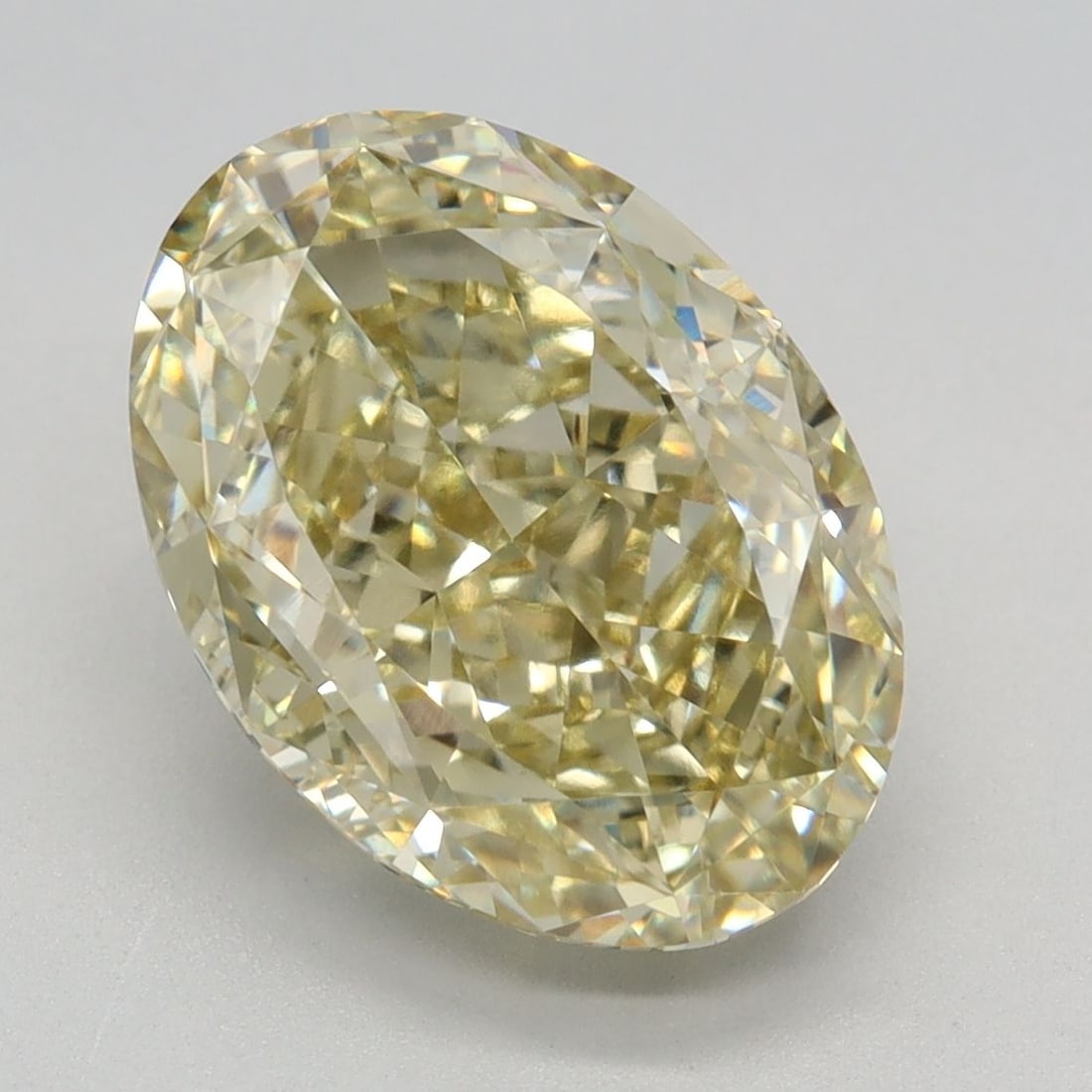 Loose Diamond - OVAL 4.12ct Fancy Yellow VVS2: Loose Diamond - OVAL 4.12ct Fancy Yellow VVS2 Source: This is a real non-mined Diamond that has been grown in a lab Shape: OVAL Carats: 4.12 Color: Fancy Yellow Certification: IGI Video: