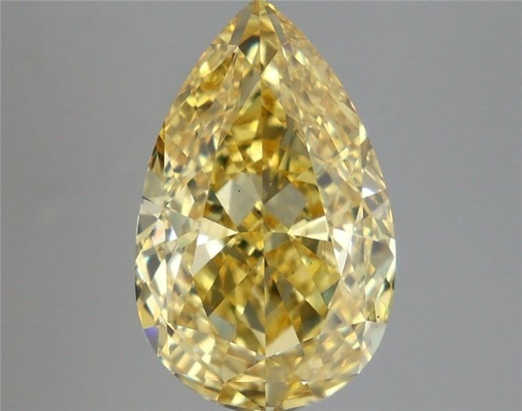 Loose Diamond - PEAR 6.09ct Fancy Vivid Yellow VS2: Loose Diamond - PEAR 6.09ct Fancy Vivid Yellow VS2 Source: This is a real non-mined Diamond that has been grown in a lab Shape: PEAR Carats: 6.09 Color: Fancy Vivid Yellow Certification: IGI Video: