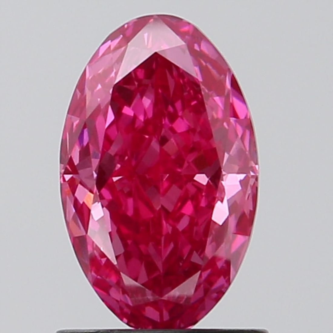 Loose Diamond - OVAL 1.2ct Fancy Vivid Pink VVS2: Loose Diamond - OVAL 1.2ct Fancy Vivid Pink VVS2 Source: This is a real non-mined Diamond that has been grown in a lab Shape: OVAL Carats: 1.2 Color: Fancy Vivid Pink Certification: NONE Video: