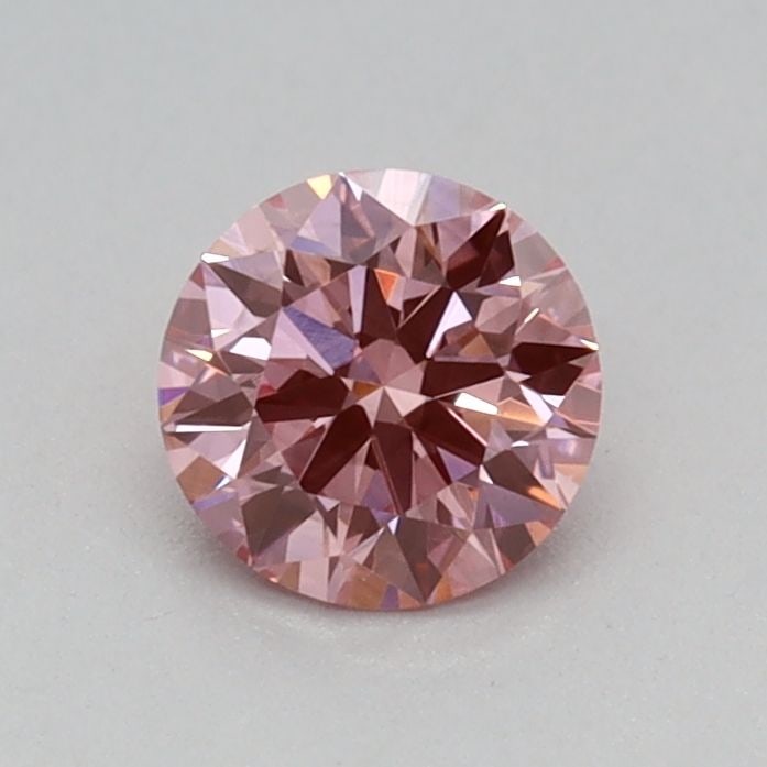 Loose Diamond - ROUND 0.3ct Fancy Vivid Pink VS2: Loose Diamond - ROUND 0.3ct Fancy Vivid Pink VS2 Source: This is a real non-mined Diamond that has been grown in a lab Shape: ROUND Carats: 0.3 Color: Fancy Vivid Pink Certification: IGI Video: