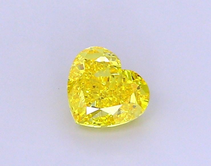 Loose Diamond - HEART 1.52ct Fancy Vivid Yellow VS1: Loose Diamond - HEART 1.52ct Fancy Vivid Yellow VS1 Source: This is a real non-mined Diamond that has been grown in a lab Shape: HEART Carats: 1.52 Color: Fancy Vivid Yellow Certification: IGI Video: