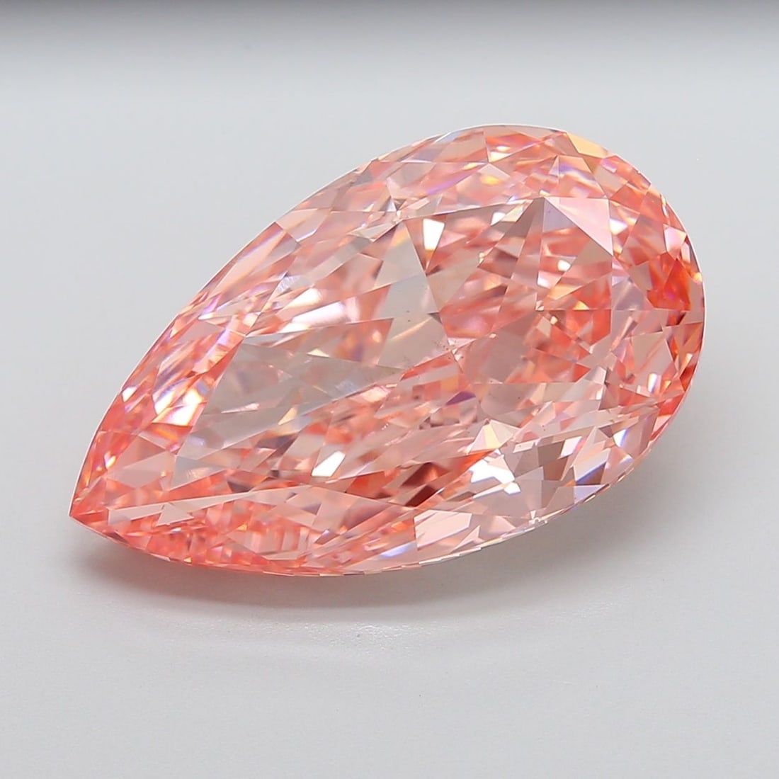Loose Diamond - PEAR 21.13ct Fancy Vivid Pink VS1: Loose Diamond - PEAR 21.13ct Fancy Vivid Pink VS1 Source: This is a real non-mined Diamond that has been grown in a lab Shape: PEAR Carats: 21.13 Color: Fancy Vivid Pink Certification: IGI Video: