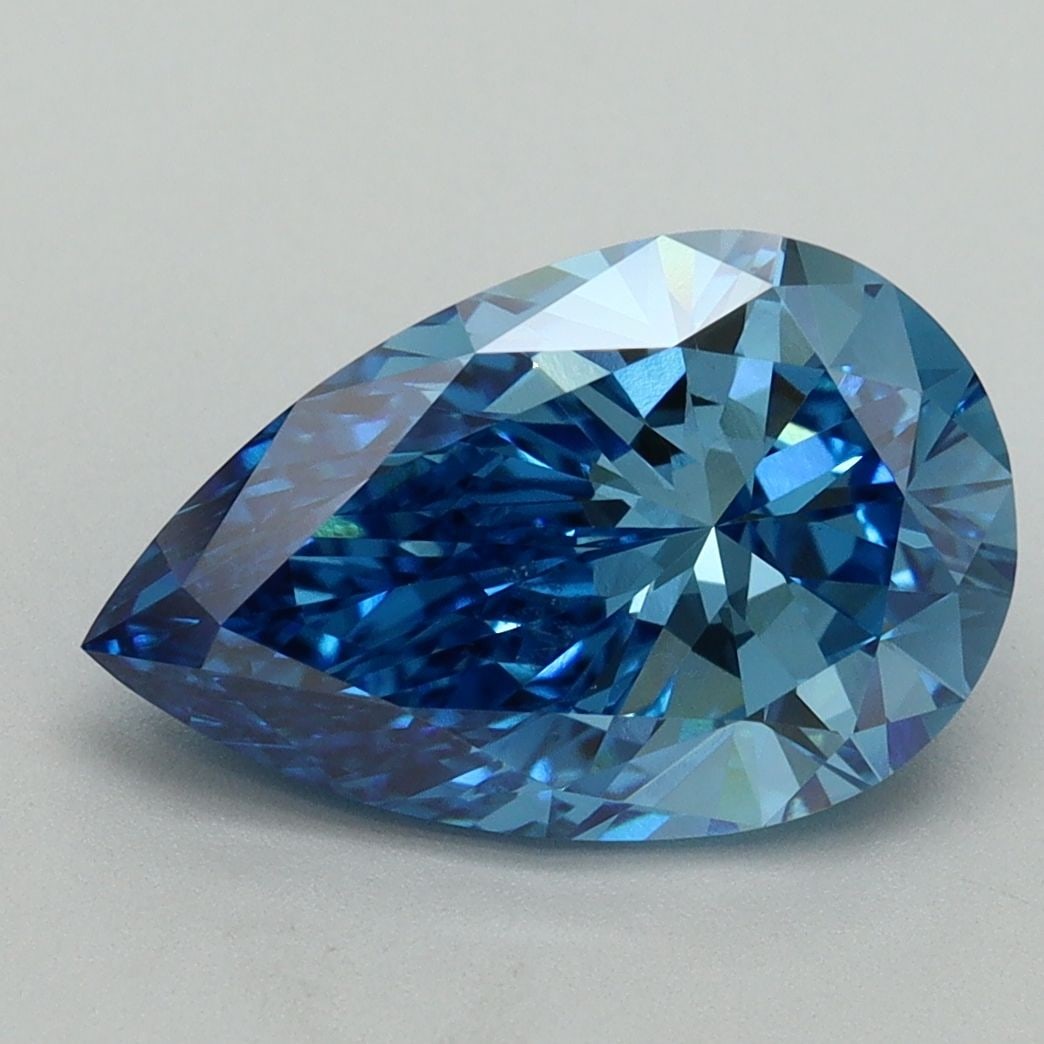 Loose Diamond - PEAR 3.02ct Fancy Vivid Blue VS1: Loose Diamond - PEAR 3.02ct Fancy Vivid Blue VS1 Source: This is a real non-mined Diamond that has been grown in a lab Shape: PEAR Carats: 3.02 Color: Fancy Vivid Blue Certification: IGI Video: