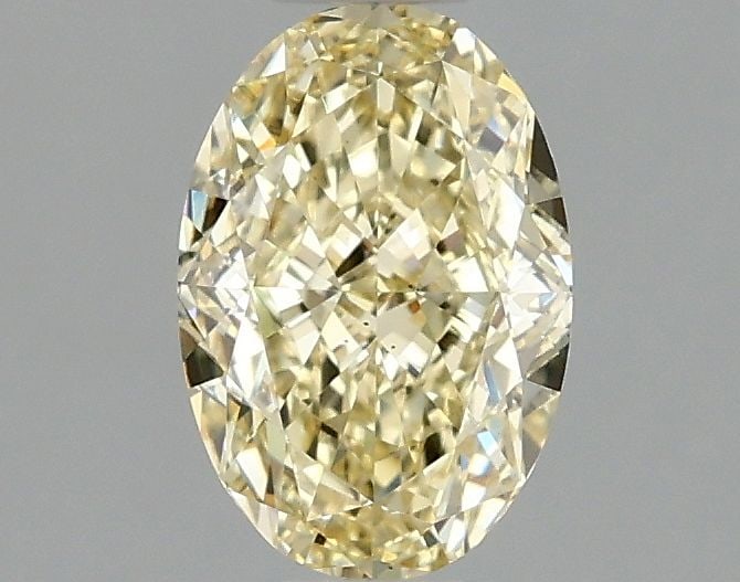 Loose Diamond - OVAL 1.1ct Fancy Yellow VS2: Loose Diamond - OVAL 1.1ct Fancy Yellow VS2 Source: This is a real non-mined Diamond that has been grown in a lab Shape: OVAL Carats: 1.1 Color: Fancy Yellow Certification: IGI Video:
