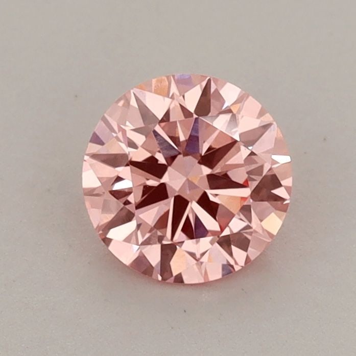 Loose Diamond - ROUND 0.68ct Fancy Vivid Pink VS1: Loose Diamond - ROUND 0.68ct Fancy Vivid Pink VS1 Source: This is a real non-mined Diamond that has been grown in a lab Shape: ROUND Carats: 0.68 Color: Fancy Vivid Pink Certification: IGI Video: