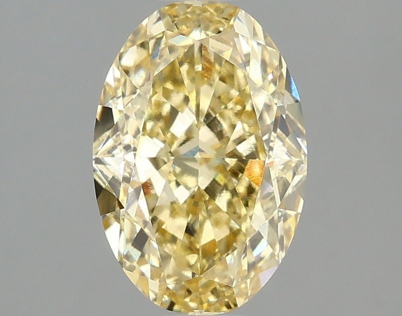 Loose Diamond - OVAL 2.07ct Fancy Vivid Yellow VS1: Loose Diamond - OVAL 2.07ct Fancy Vivid Yellow VS1 Source: This is a real non-mined Diamond that has been grown in a lab Shape: OVAL Carats: 2.07 Color: Fancy Vivid Yellow Certification: IGI Video: