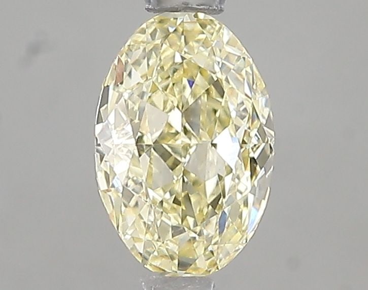 Loose Diamond - OVAL 1.03ct Fancy Light Yellow VVS2: Loose Diamond - OVAL 1.03ct Fancy Light Yellow VVS2 Source: This is a real non-mined Diamond that has been grown in a lab Shape: OVAL Carats: 1.03 Color: Fancy Light Yellow Certification: IGI Video: