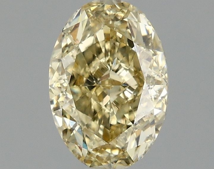 Loose Diamond - OVAL 1.0ct Fancy Yellow VVS1: Loose Diamond - OVAL 1.0ct Fancy Yellow VVS1 Source: This is a real non-mined Diamond that has been grown in a lab Shape: OVAL Carats: 1.0 Color: Fancy Yellow Certification: IGI Video: