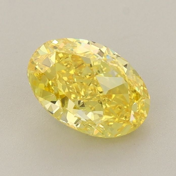 Loose Diamond - OVAL 1.06ct Fancy Vivid Yellow VS2: Loose Diamond - OVAL 1.06ct Fancy Vivid Yellow VS2 Source: This is a real non-mined Diamond that has been grown in a lab Shape: OVAL Carats: 1.06 Color: Fancy Vivid Yellow Certification: IGI Video: