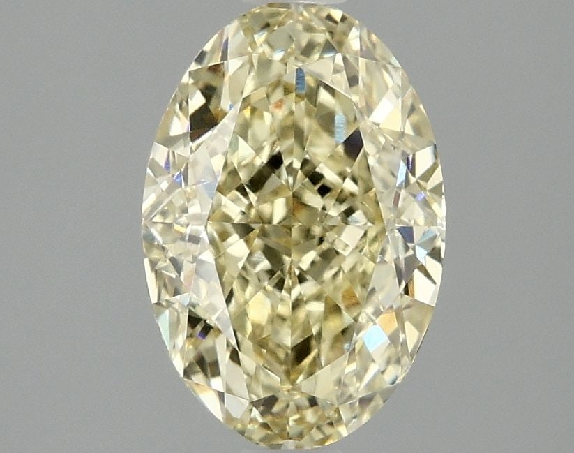Loose Diamond - OVAL 2.1ct Fancy Intense Yellow VS1: Loose Diamond - OVAL 2.1ct Fancy Intense Yellow VS1 Source: This is a real non-mined Diamond that has been grown in a lab Shape: OVAL Carats: 2.1 Color: Fancy Intense Yellow Certification: IGI Video: