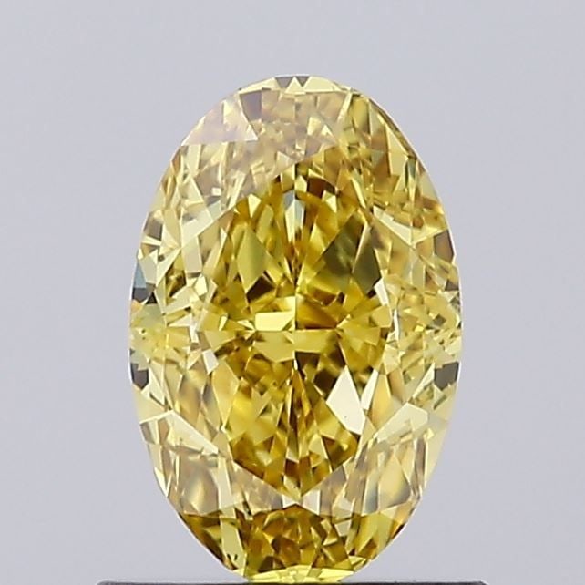 Loose Diamond - OVAL 1.12ct Fancy Vivid Yellow VS1: Loose Diamond - OVAL 1.12ct Fancy Vivid Yellow VS1 Source: This is a real non-mined Diamond that has been grown in a lab Shape: OVAL Carats: 1.12 Color: Fancy Vivid Yellow Certification: IGI Video: