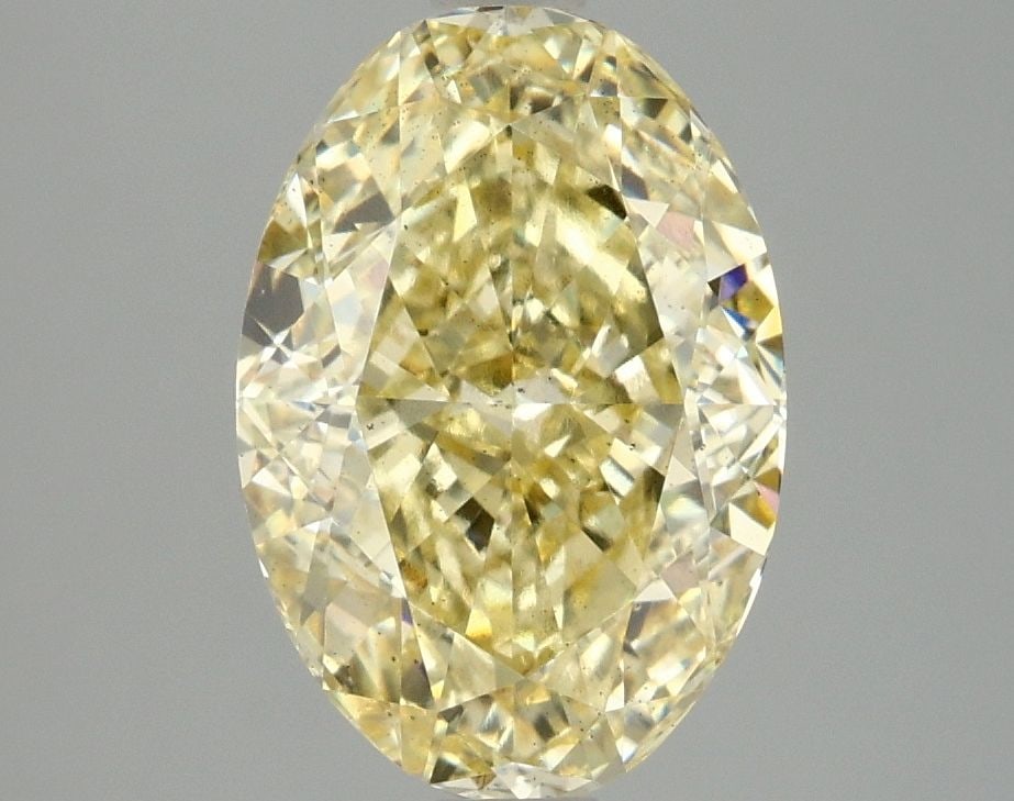 Loose Diamond - OVAL 3.1ct Fancy Intense Yellow SI1: Loose Diamond - OVAL 3.1ct Fancy Intense Yellow SI1 Source: This is a real non-mined Diamond that has been grown in a lab Shape: OVAL Carats: 3.1 Color: Fancy Intense Yellow Certification: IGI Video: