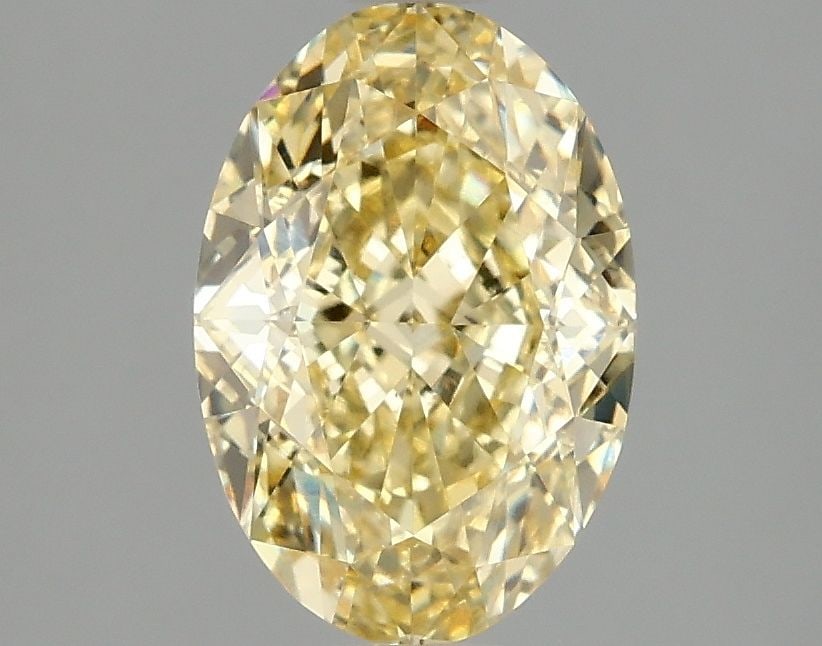 Loose Diamond - OVAL 2.07ct Fancy Vivid Yellow VS1: Loose Diamond - OVAL 2.07ct Fancy Vivid Yellow VS1 Source: This is a real non-mined Diamond that has been grown in a lab Shape: OVAL Carats: 2.07 Color: Fancy Vivid Yellow Certification: IGI Video:
