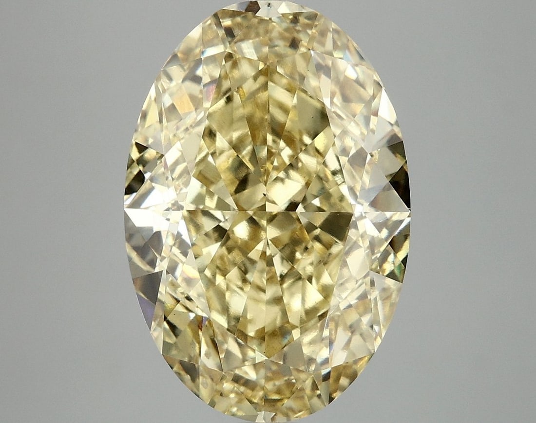 Loose Diamond - OVAL 8.07ct Fancy Vivid Yellow VS1: Loose Diamond - OVAL 8.07ct Fancy Vivid Yellow VS1 Source: This is a real non-mined Diamond that has been grown in a lab Shape: OVAL Carats: 8.07 Color: Fancy Vivid Yellow Certification: IGI Video: