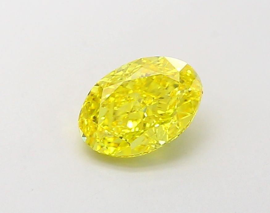 Loose Diamond - OVAL 1.1ct Fancy Vivid Yellow VVS2: Loose Diamond - OVAL 1.1ct Fancy Vivid Yellow VVS2 Source: This is a real non-mined Diamond that has been grown in a lab Shape: OVAL Carats: 1.1 Color: Fancy Vivid Yellow Certification: IGI Video: