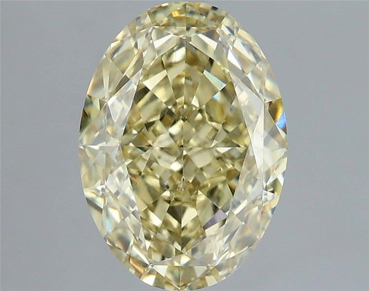 Loose Diamond - OVAL 3.06ct Fancy Yellow VS1: Loose Diamond - OVAL 3.06ct Fancy Yellow VS1 Source: This is a real non-mined Diamond that has been grown in a lab Shape: OVAL Carats: 3.06 Color: Fancy Yellow Certification: IGI Video: