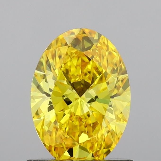 Loose Diamond - OVAL 1.01ct Fancy Vivid Yellow VVS2: Loose Diamond - OVAL 1.01ct Fancy Vivid Yellow VVS2 Source: This is a real non-mined Diamond that has been grown in a lab Shape: OVAL Carats: 1.01 Color: Fancy Vivid Yellow Certification: IGI Video: