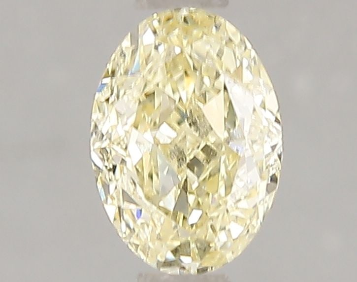 Loose Diamond - OVAL 1.0ct Fancy Yellow VS2: Loose Diamond - OVAL 1.0ct Fancy Yellow VS2 Source: This is a real non-mined Diamond that has been grown in a lab Shape: OVAL Carats: 1.0 Color: Fancy Yellow Certification: IGI Video: