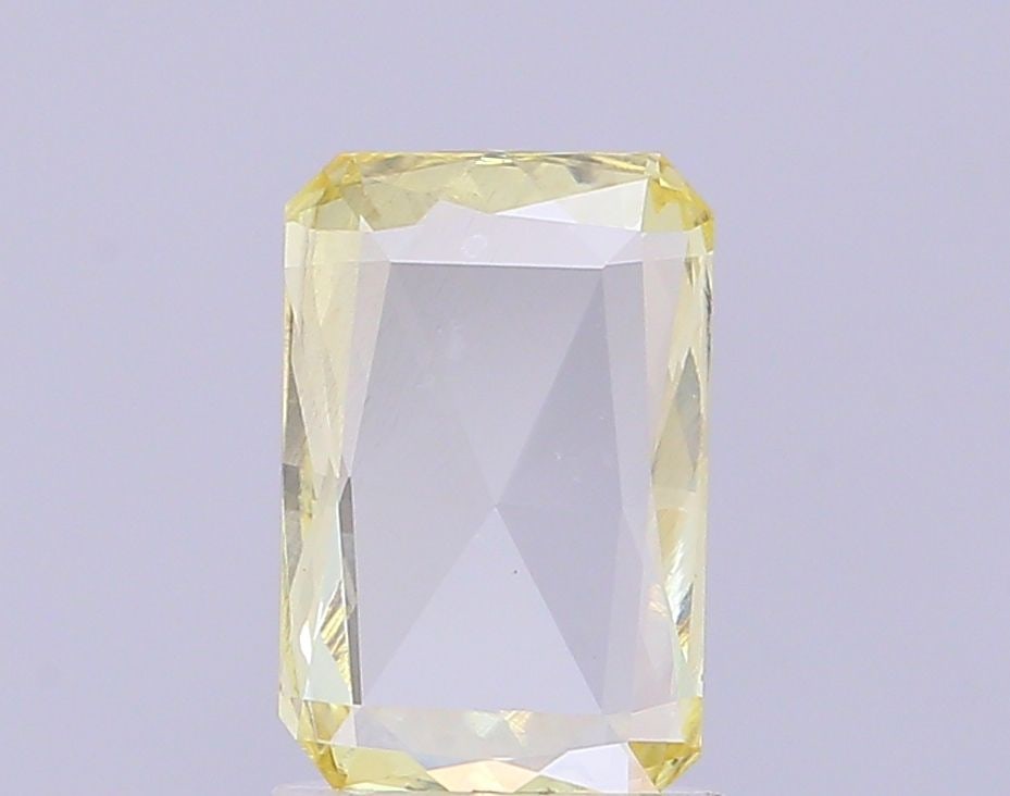 Loose Diamond - RADIANT 0.79ct Fancy Yellow VS1: Loose Diamond - RADIANT 0.79ct Fancy Yellow VS1 Source: This is a real non-mined Diamond that has been grown in a lab Shape: RADIANT Carats: 0.79 Color: Fancy Yellow Certification: IGI Video: