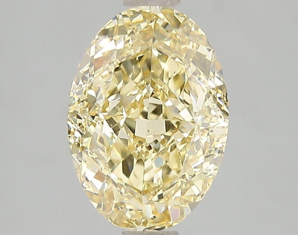 Loose Diamond - OVAL 3.04ct Fancy Vivid Yellow VS1: Loose Diamond - OVAL 3.04ct Fancy Vivid Yellow VS1 Source: This is a real non-mined Diamond that has been grown in a lab Shape: OVAL Carats: 3.04 Color: Fancy Vivid Yellow Certification: IGI Video: