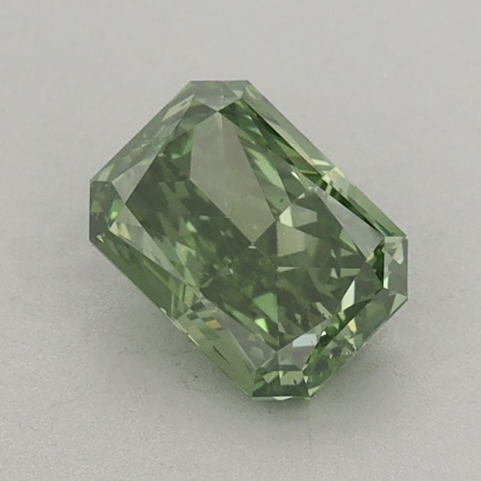 Loose Diamond - RADIANT 0.84ct Fancy Vivid Green VS2: Loose Diamond - RADIANT 0.84ct Fancy Vivid Green VS2 Source: This is a real non-mined Diamond that has been grown in a lab Shape: RADIANT Carats: 0.84 Color: Fancy Vivid Green Certification: IGI Video
