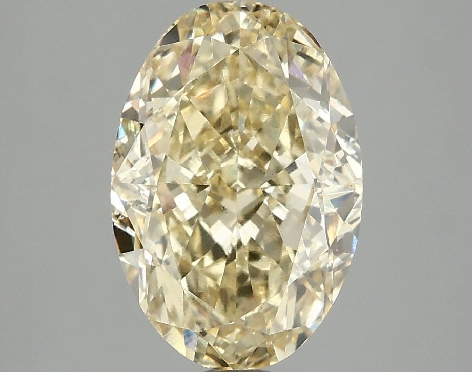 Loose Diamond - OVAL 3.07ct Fancy Vivid Yellow VS2: Loose Diamond - OVAL 3.07ct Fancy Vivid Yellow VS2 Source: This is a real non-mined Diamond that has been grown in a lab Shape: OVAL Carats: 3.07 Color: Fancy Vivid Yellow Certification: IGI Video: