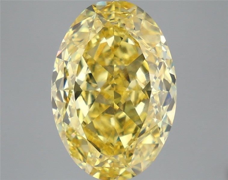 Loose Diamond - OVAL 6.45ct Fancy Vivid Yellow VS1: Loose Diamond - OVAL 6.45ct Fancy Vivid Yellow VS1 Source: This is a real non-mined Diamond that has been grown in a lab Shape: OVAL Carats: 6.45 Color: Fancy Vivid Yellow Certification: IGI Video: