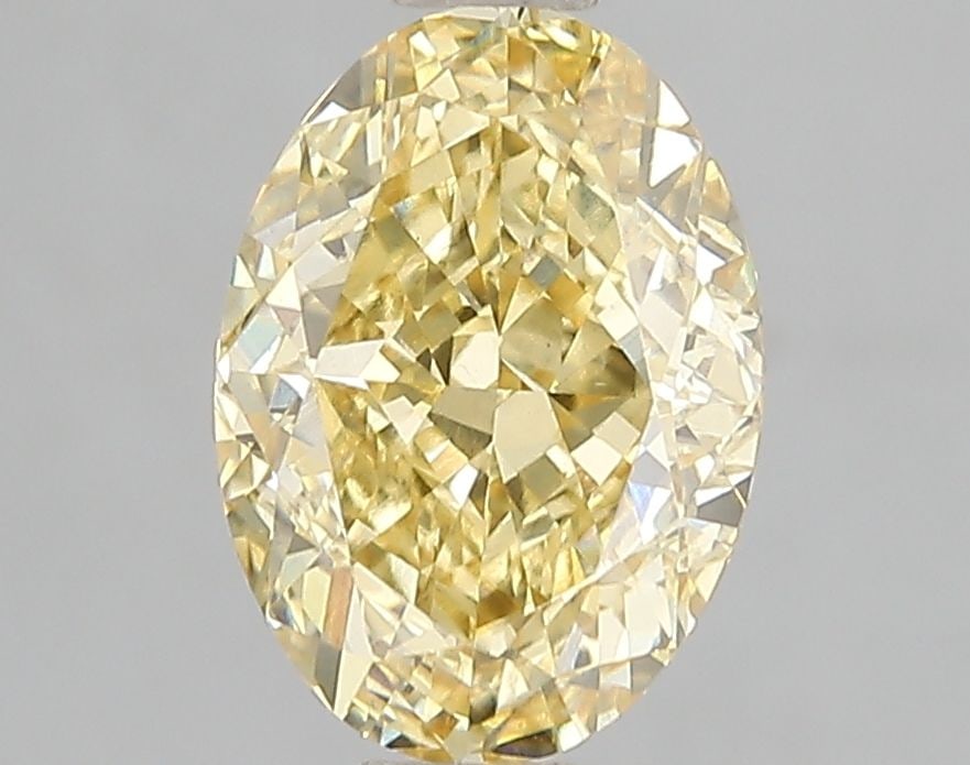 Loose Diamond - OVAL 2.5ct Fancy Vivid Yellow VS1: Loose Diamond - OVAL 2.5ct Fancy Vivid Yellow VS1 Source: This is a real non-mined Diamond that has been grown in a lab Shape: OVAL Carats: 2.5 Color: Fancy Vivid Yellow Certification: IGI Video: