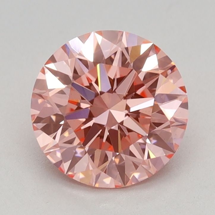 Ideal Loose Diamond - ROUND 0.95ct Fancy Vivid Pink VS1: Ideal Loose Diamond - ROUND 0.95ct Fancy Vivid Pink VS1 Source: This is a real non-mined Diamond that has been grown in a lab Shape: ROUND Carats: 0.95 Color: Fancy Vivid Pink Certification: IGI Video