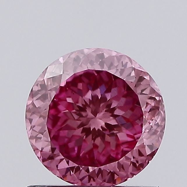 Loose Diamond - ROUND 0.98ct Fancy Vivid Pink SI1: Loose Diamond - ROUND 0.98ct Fancy Vivid Pink SI1 Source: This is a real non-mined Diamond that has been grown in a lab Shape: ROUND Carats: 0.98 Color: Fancy Vivid Pink Certification: IGI Video: