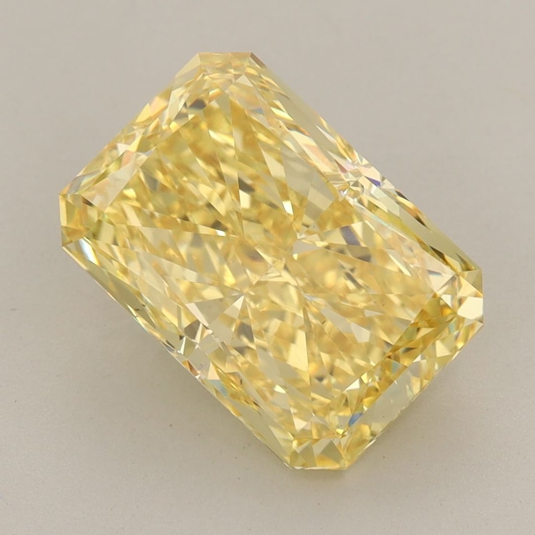 Loose Diamond - RADIANT 4.91ct Fancy Vivid Yellow VS2: Loose Diamond - RADIANT 4.91ct Fancy Vivid Yellow VS2 Source: This is a real non-mined Diamond that has been grown in a lab Shape: RADIANT Carats: 4.91 Color: Fancy Vivid Yellow Certification: IGI