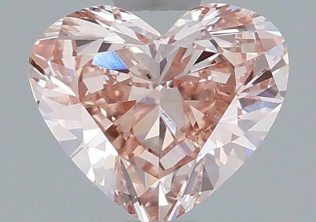 Loose Diamond - HEART 0.58ct Fancy Pink VVS2: Loose Diamond - HEART 0.58ct Fancy Pink VVS2 Source: This is a real non-mined Diamond that has been grown in a lab Shape: HEART Carats: 0.58 Color: Fancy Pink Certification: IGI Video: