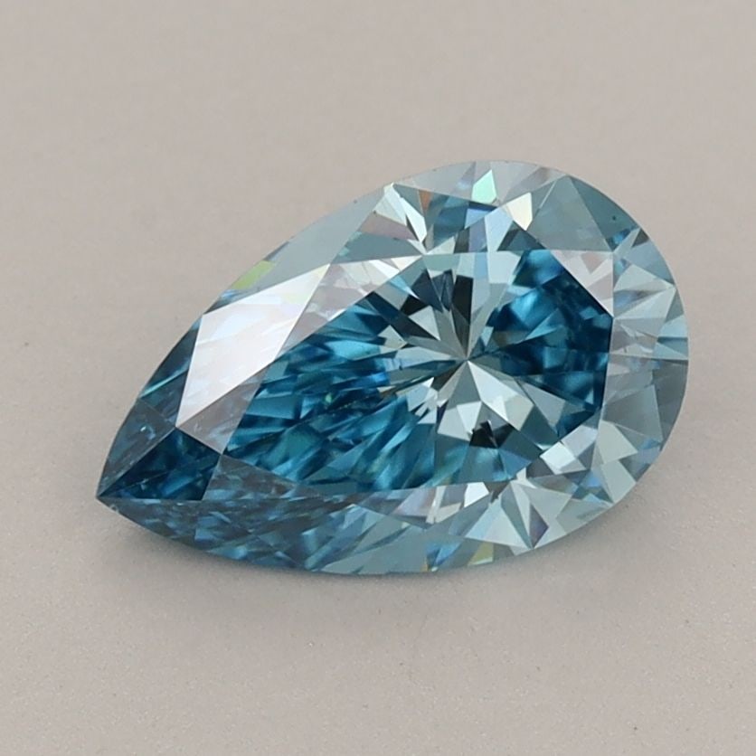 Loose Diamond - PEAR 1.3ct Fancy Vivid Blue VS1: Loose Diamond - PEAR 1.3ct Fancy Vivid Blue VS1 Source: This is a real non-mined Diamond that has been grown in a lab Shape: PEAR Carats: 1.3 Color: Fancy Vivid Blue Certification: IGI Video: