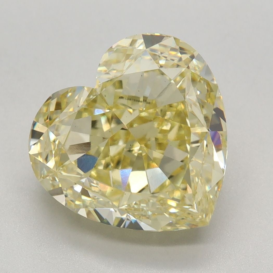 Loose Diamond - HEART 3.84ct Fancy Intense Yellow VS1: Loose Diamond - HEART 3.84ct Fancy Intense Yellow VS1 Source: This is a real non-mined Diamond that has been grown in a lab Shape: HEART Carats: 3.84 Color: Fancy Intense Yellow Certification: IGI Vid