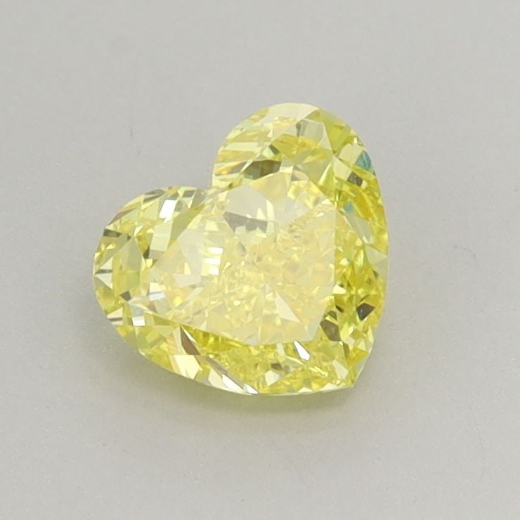Loose Diamond - HEART 0.87ct Fancy Vivid Yellow VS1: Loose Diamond - HEART 0.87ct Fancy Vivid Yellow VS1 Source: This is a real non-mined Diamond that has been grown in a lab Shape: HEART Carats: 0.87 Color: Fancy Vivid Yellow Certification: IGI Video: