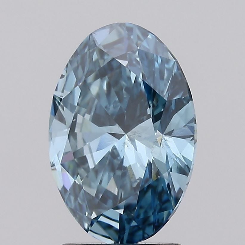 Loose Diamond - OVAL 2.1ct Fancy Vivid Greenish Blue SI1: Loose Diamond - OVAL 2.1ct Fancy Vivid Greenish Blue SI1 Source: This is a real non-mined Diamond that has been grown in a lab Shape: OVAL Carats: 2.1 Color: Fancy Vivid Greenish Blue Certification: