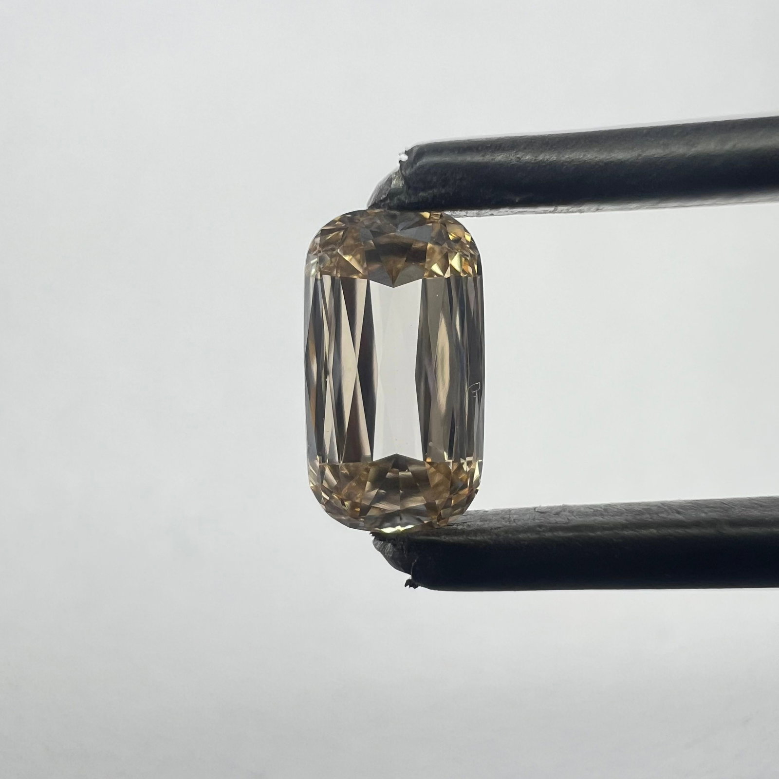 Loose Diamond - OTHER 0.59ct Champagne VS2: Loose Diamond - OTHER 0.59ct Champagne VS2 Source: This is a real non-mined Diamond that has been grown in a lab Shape: OTHER Carats: 0.59 Color: Champagne Certification: NONE PLEASE NOTE: Framed,