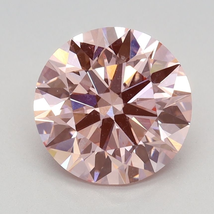 Ideal Loose Diamond - ROUND 1.99ct Fancy Vivid Pink VS2: Ideal Loose Diamond - ROUND 1.99ct Fancy Vivid Pink VS2 Source: This is a real non-mined Diamond that has been grown in a lab Shape: ROUND Carats: 1.99 Color: Fancy Vivid Pink Certification: IGI Video