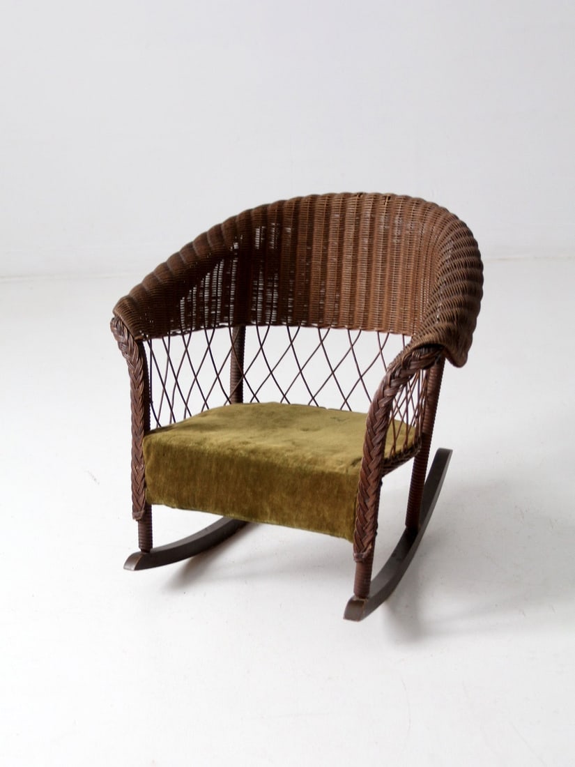 Victorian Antique Wicker Children's Rocking Chair with Velvet Seat: Victorian Antique Wicker Children's Rocking Chair with Velvet Seat This charming 19th century antique wicker kid's rocker features a rounded back and lattice sides, complemented by an olive velvet sea