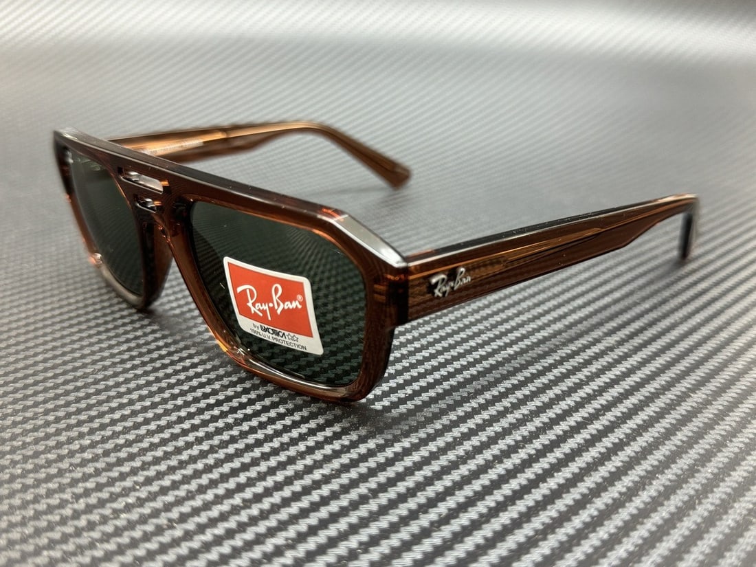 Ray-Ban RB4397 667882 Unisex Transparent Brown Green Sunglasses: Ray-Ban RB4397 667882 Unisex Transparent Brown Green Sunglasses Experience style and protection with these Ray Ban RB4397 sunglasses. Designed with a transparent brown frame, these unisex sunglasses f