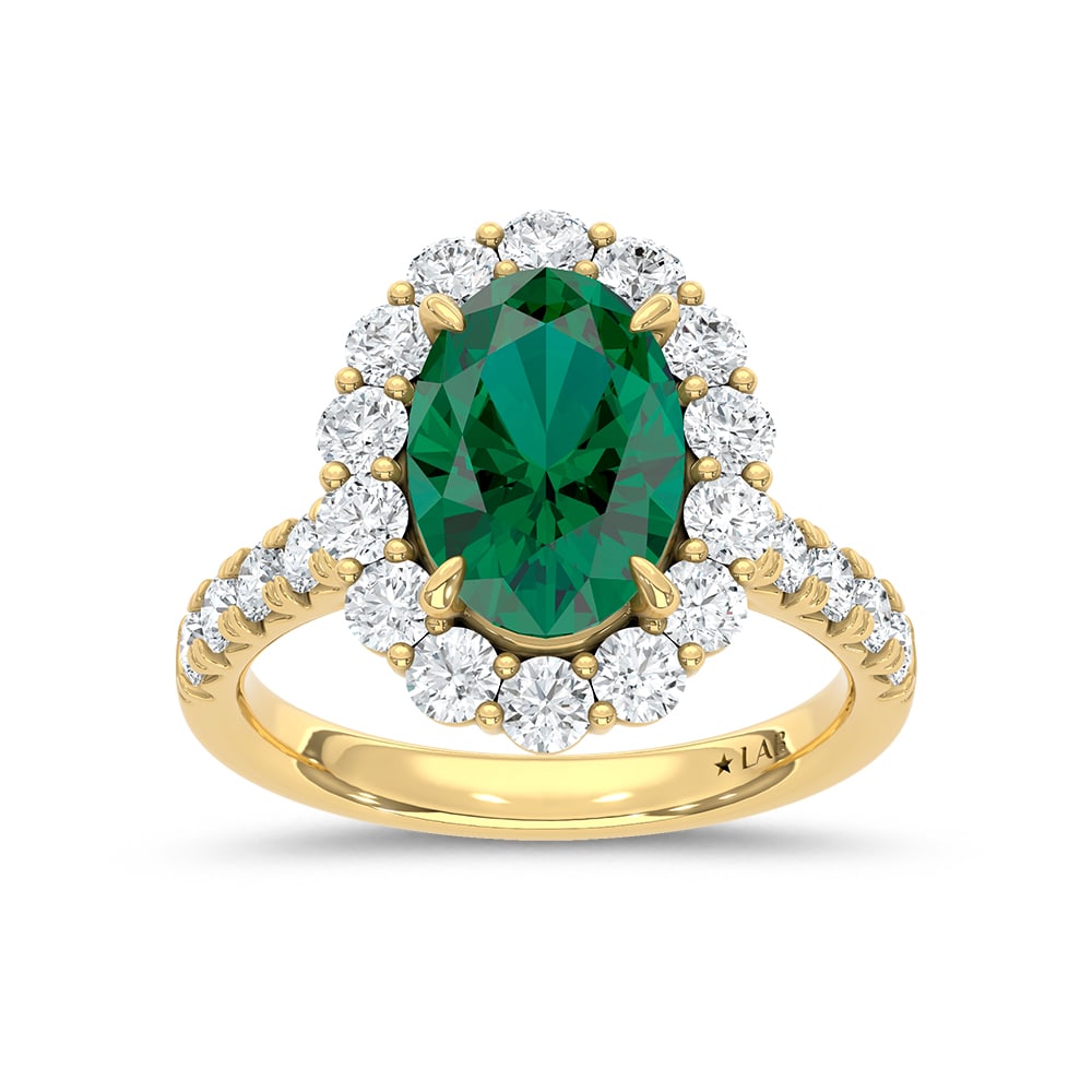 14K Yellow Gold Lab Grown Diamond 4 7/8 Ct.Tw. Oval Shape Recrystalized Emerald Engagement Ring: 14K Yellow Gold Lab Grown Diamond 4 7/8 Ct.Tw. Oval Shape Recrystalized Emerald Engagement Ring (Center 3 3/8 ct) Celebrate your love with this stunning 14K yellow gold engagement ring. Its centerpiec