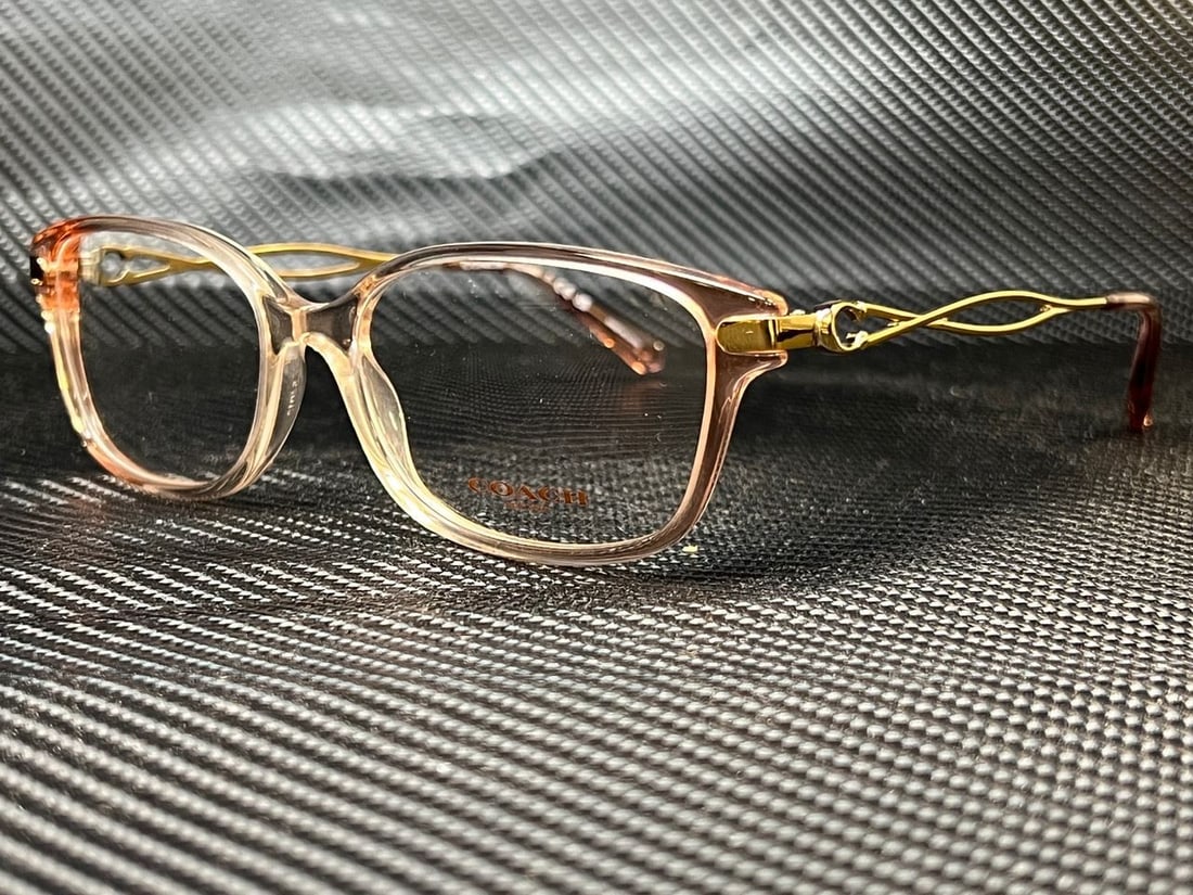 COACH HC6172 5640 Women's Gradient Peach Eyeglasses with Clear Lenses: COACH HC6172 5640 Women's Gradient Peach Eyeglasses with Clear Lenses Elevate your style with these COACH HC6172 5640 eyeglasses featuring a chic gradient transparent peach frame that perfectly comple