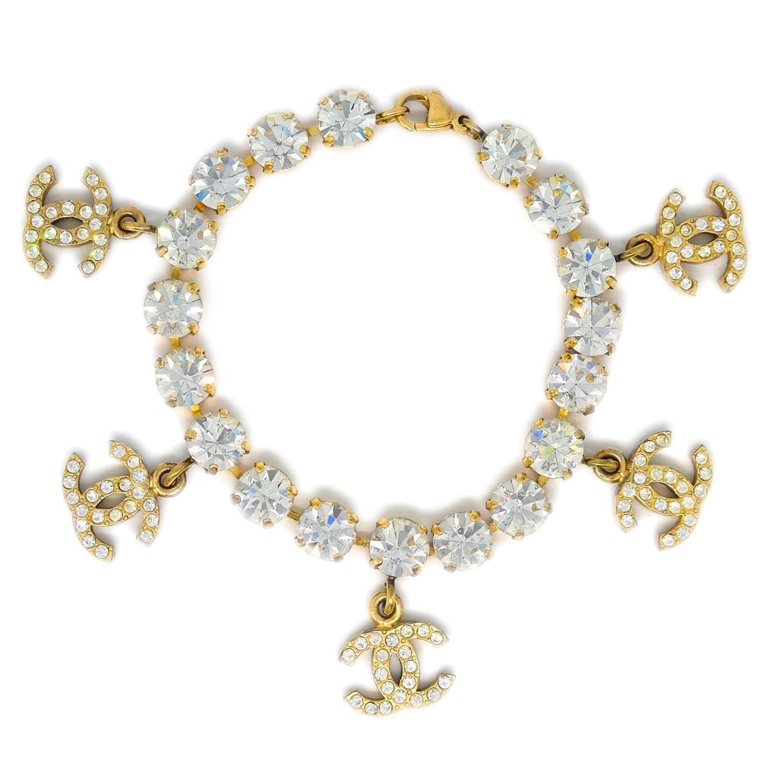 Chanel Gold-Plated Rhinestone Chain Bracelet 96P Elegant Jewelry: Chanel Gold-Plated Rhinestone Chain Bracelet 96P Elegant Jewelry This stunning Chanel Rhinestone Chain Bracelet features a luxurious gold-plated design accentuated with sparkling rhinestones. The brac