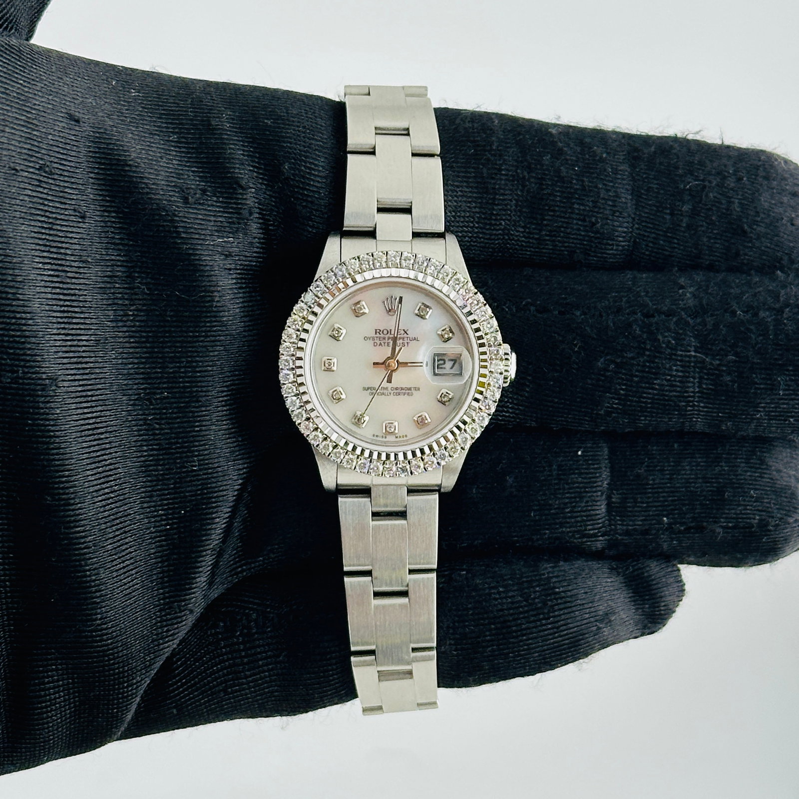 Ladies Rolex Datejust 79190 Oyster Bracelet White MOP Diamond Dial: Ladies Rolex Datejust 79190 Oyster Bracelet White MOP Diamond Dial This ladies' Rolex Datejust features an after-market white mother-of-pearl diamond dial, complemented by a prong-set diamond bezel. T