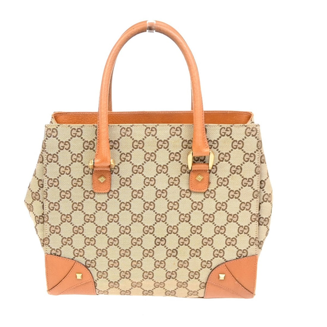 Gucci Beige GG Canvas Tote Nailhead Design 27.5x24x9cm: Gucci Beige GG Canvas Tote Nailhead Design 27.5x24x9cm This pre-owned Gucci Nailhead Tote for women is crafted from beige canvas and features gold-plated hardware with nailhead detailing. It shows sig