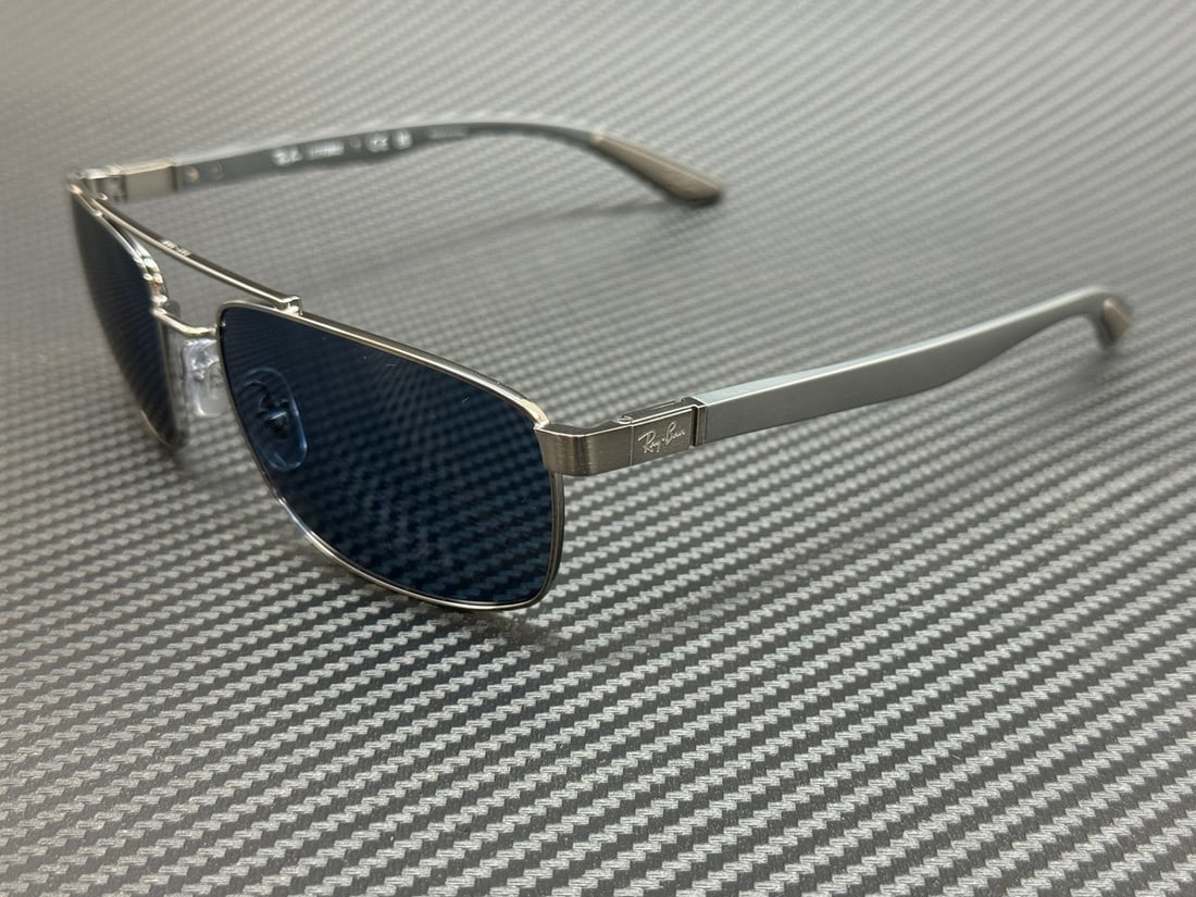Ray-Ban RB3737 Gunmetal Blue Sunglasses with Authenticity Certificate: Ray-Ban RB3737 Gunmetal Blue Sunglasses with Authenticity Certificate Elevate your eyewear collection with these Ray-Ban RB3737 sunglasses, featuring a sleek gunmetal frame and striking blue lenses. D