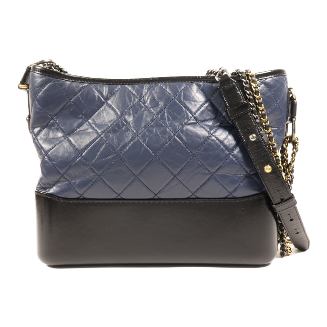CHANEL Gabrielle Medium Navy Black Lambskin Shoulder Bag: CHANEL Gabrielle Medium Navy Black Lambskin Shoulder Bag This CHANEL Gabrielle Medium Chain Shoulder Bag is crafted from luxurious lambskin leather in a sophisticated navy color. With its elegant desi