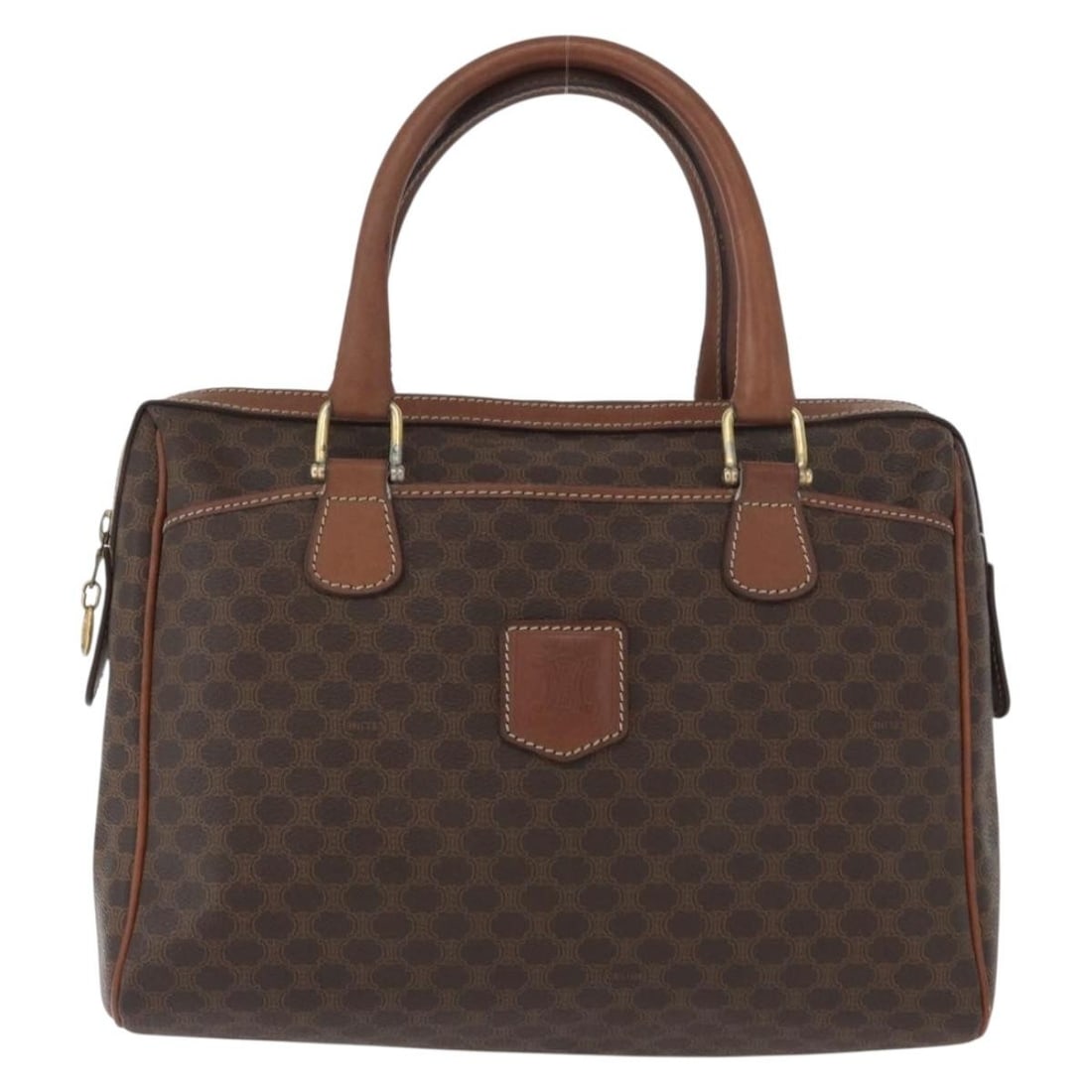 Vintage Macadam Shoulder Bag by Celine in Brown Canvas and Leather: Vintage Macadam Shoulder Bag by Celine in Brown Canvas and Leather This Celine Vintage Macadam handbag is crafted from canvas with leather accents in a brown colorway. Made in Italy, it features a spa