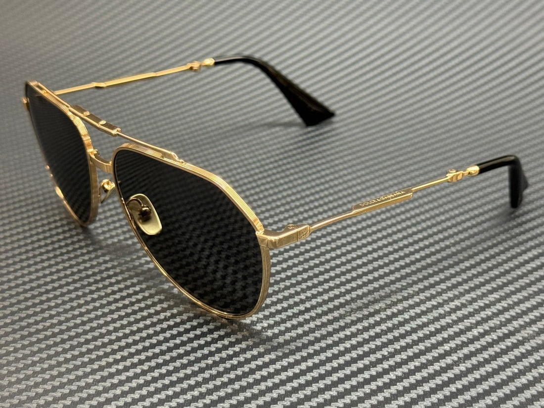 Dolce&Gabbana DG2302 Gold Grey Unisex 60mm Folding Sunglasses: Dolce&Gabbana DG2302 Gold Grey Unisex 60mm Folding Sunglasses Elevate your style with these Dolce & Gabbana DG2302 02 R5 Sunglasses, designed for both men and women. The luxurious gold frame exudes so