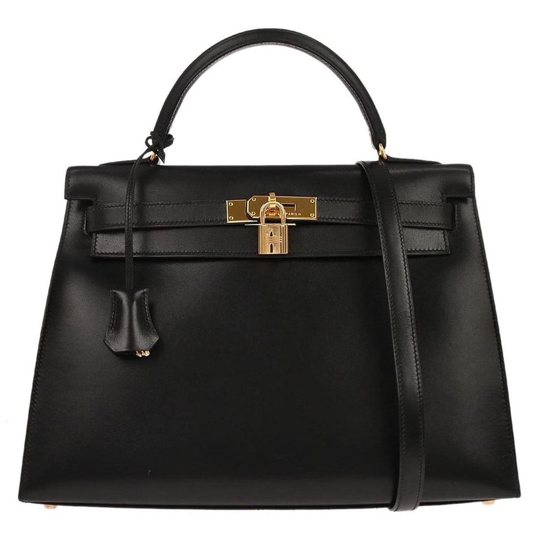 Black Leather Kelly 32 Sellier Two Way Top Handle Bag by Hermes: Black Leather Kelly 32 Sellier Two Way Top Handle Bag by Hermes This Hermes Kelly 32 Sellier handbag is crafted from black box calf leather and features a structured silhouette with a top handle and a